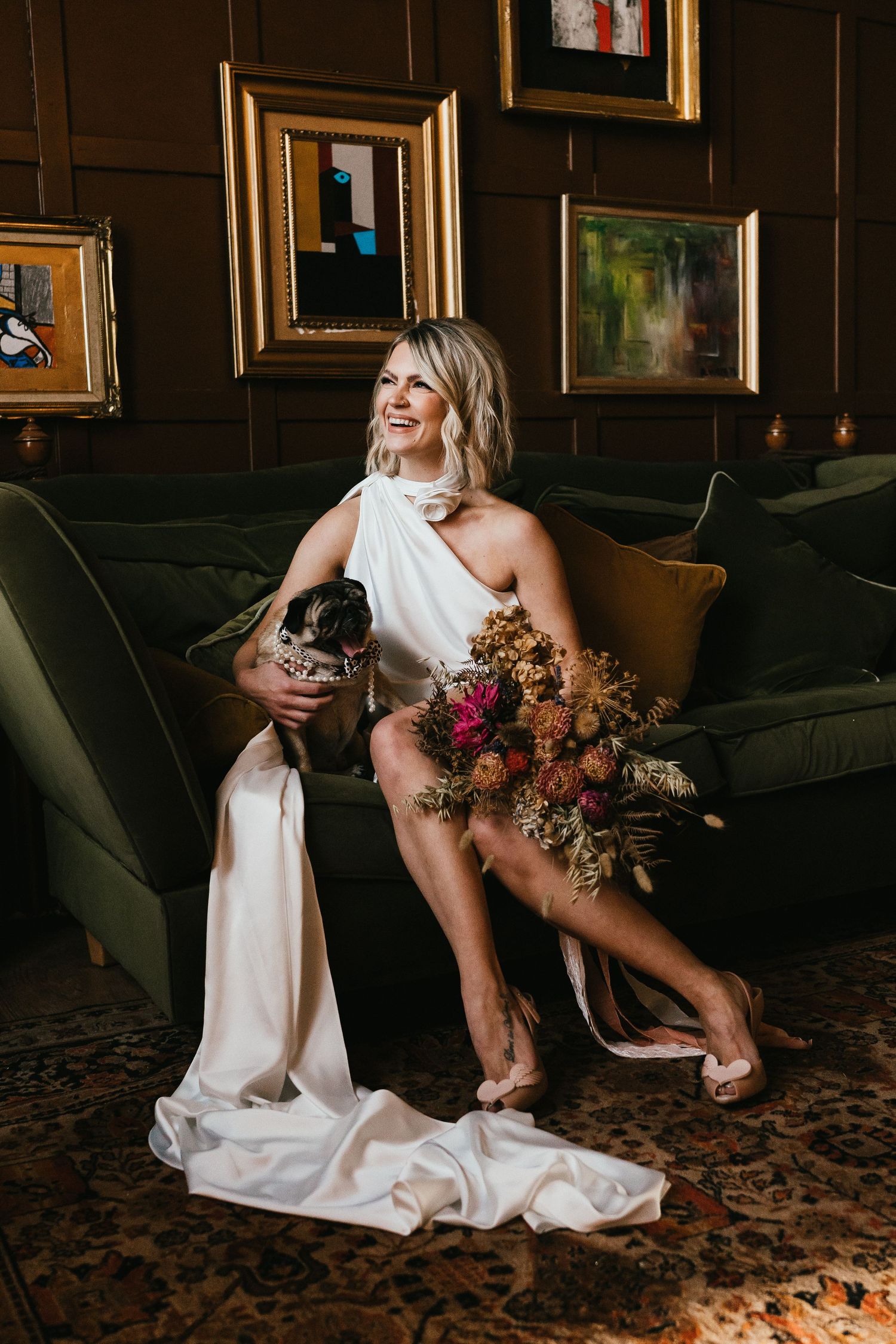 Quirky cool elopement photography. Couple eating pizza  at Wellington house in Ayrshire. With their dog