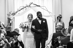 University Whist Club wedding, mixed race bride and groom exiting ceremony