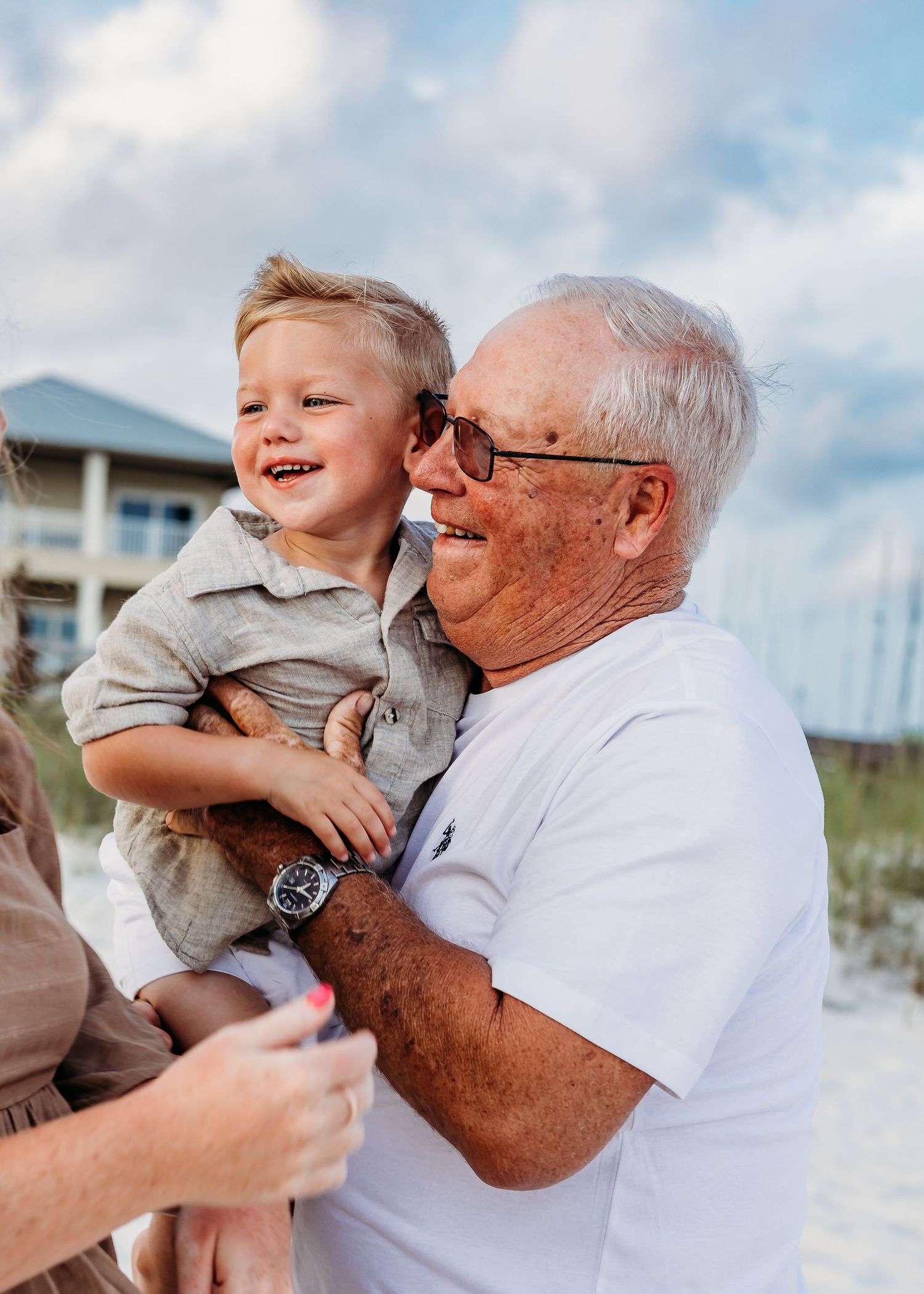 Joyful interactions between family members captured in sequence at the beach.