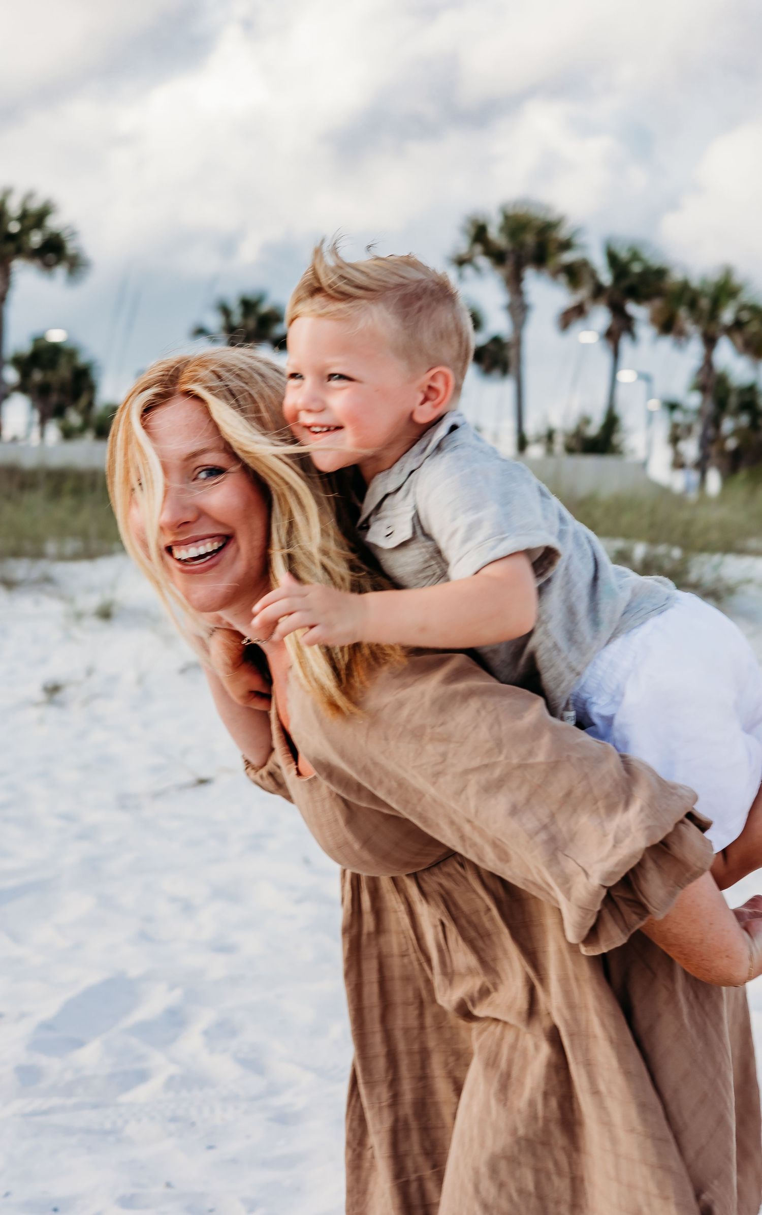 Fun family moments captured against a palm tree and white sand beach backdrop.