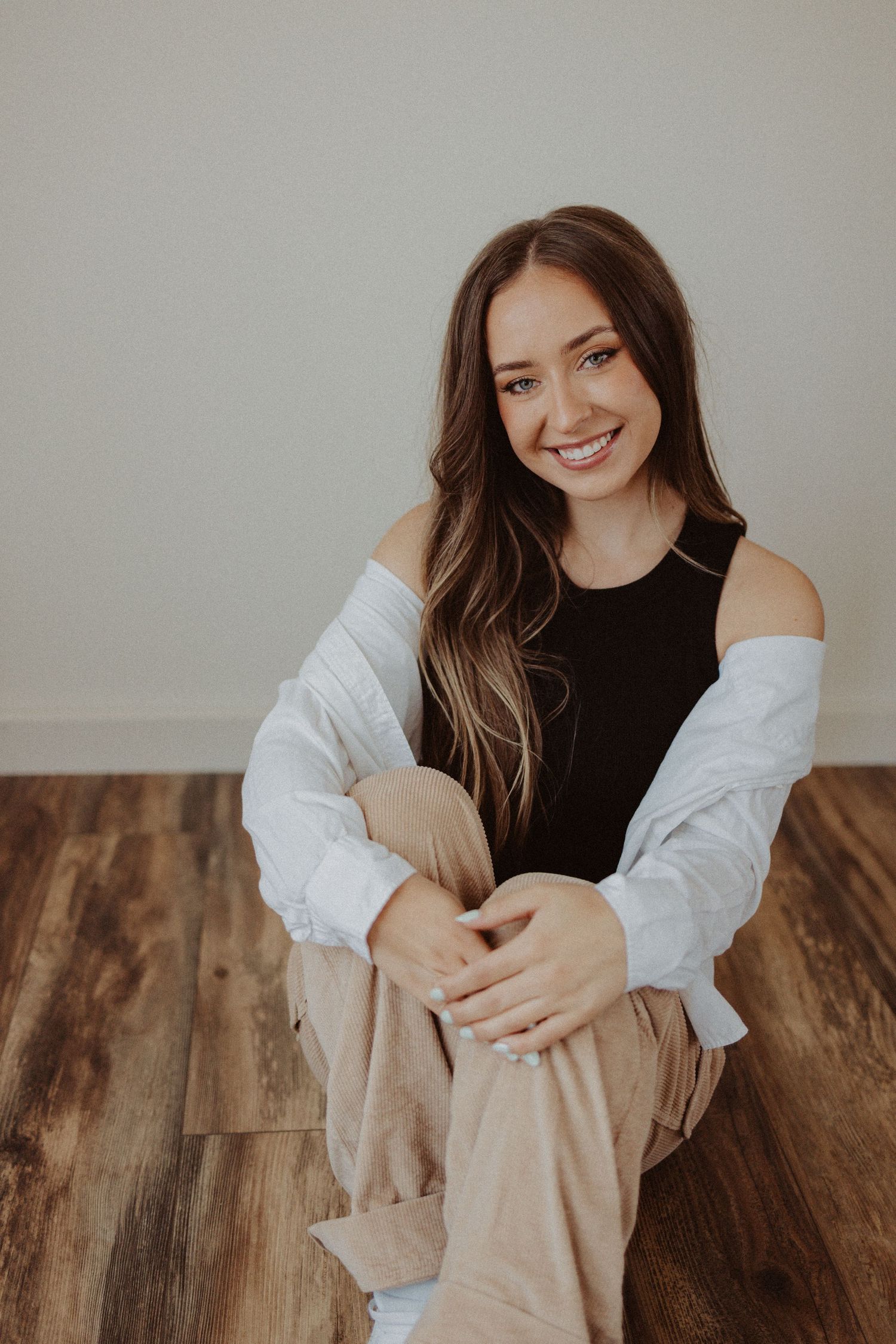 small business owner smiles for branding studio session