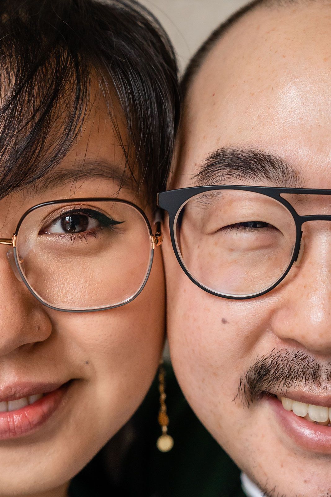 Close up of husband and wife smiling in Seattle