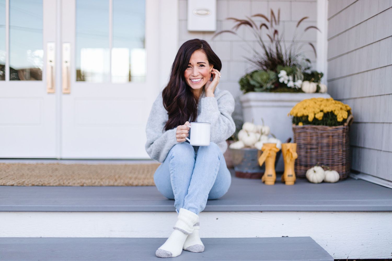 Casual lifestyle photos on front porch with autumn decor.