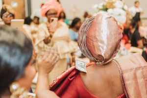 Wedding party guests celebrate with energy and joy during lively reception festivities.