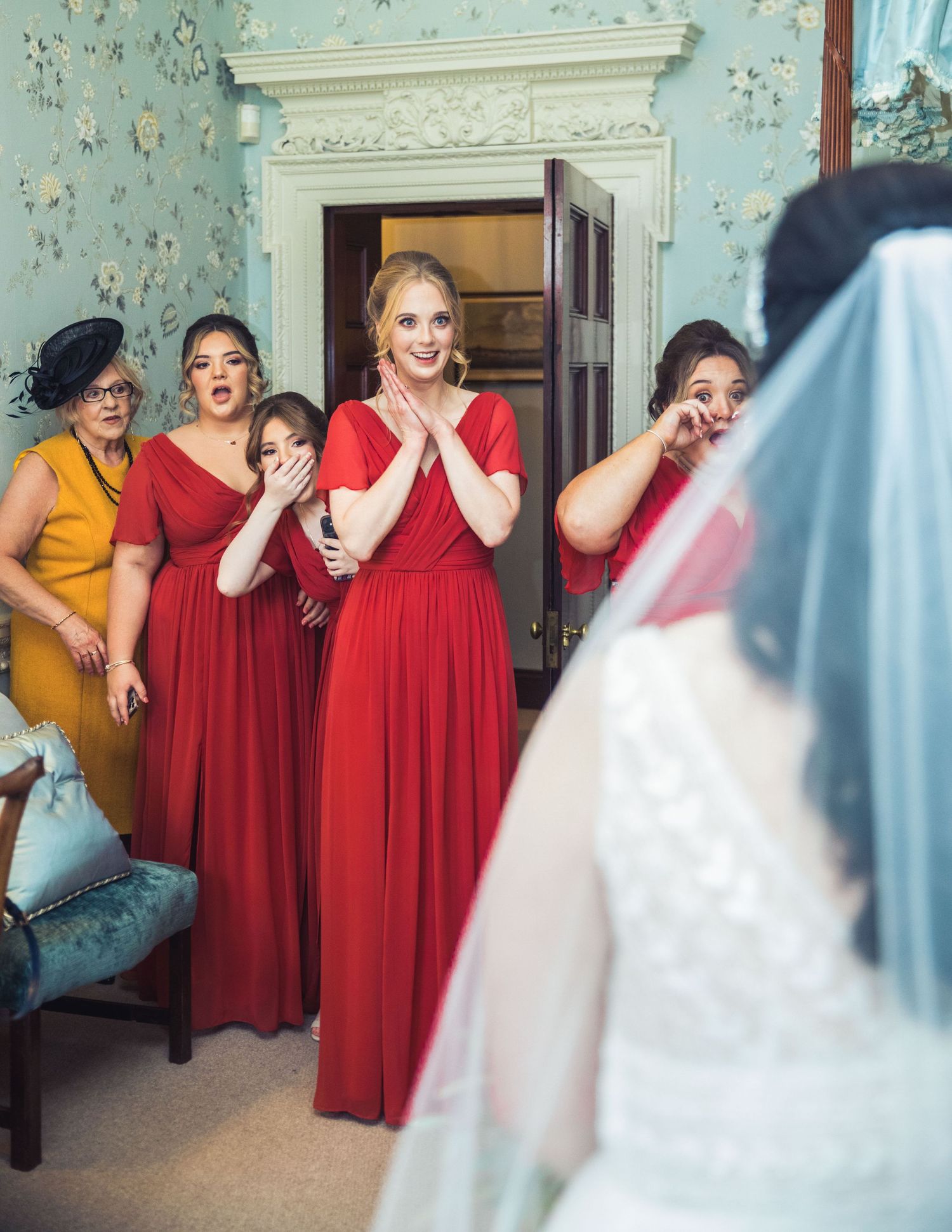 Bridesmaids beautifully react to bride at Knowsley Hall wedding