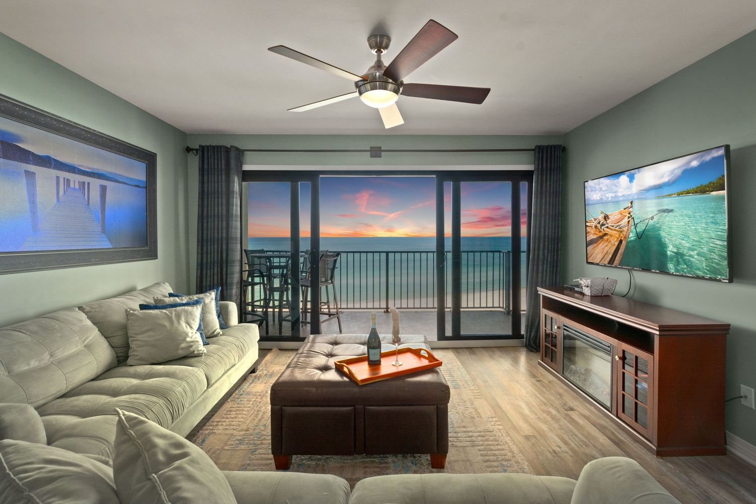 Luxurious beachfront living room with panoramic ocean views and modern coastal decor.