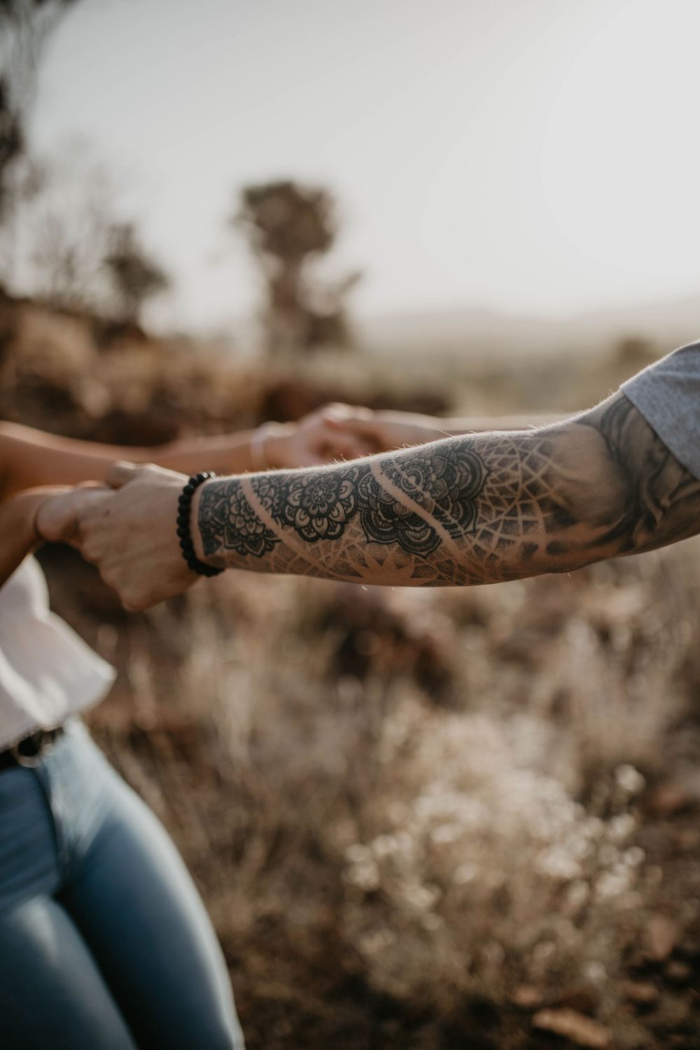 Detail shots of couple holding hand in Mount Isa