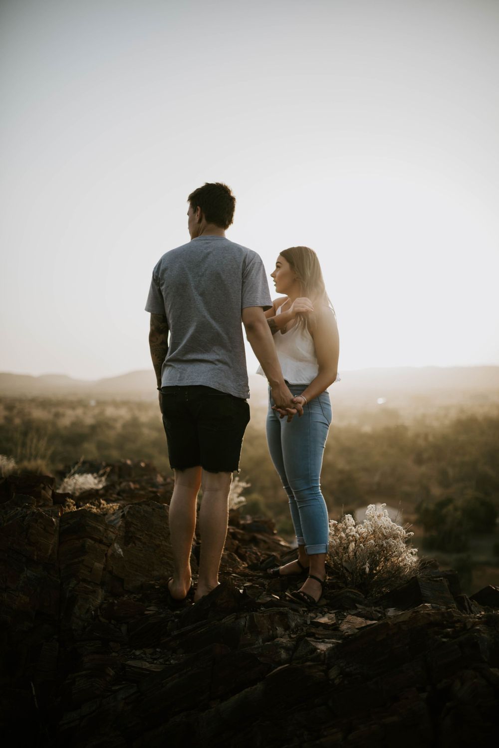 Couple enjoying view of sunset in Mount Isa