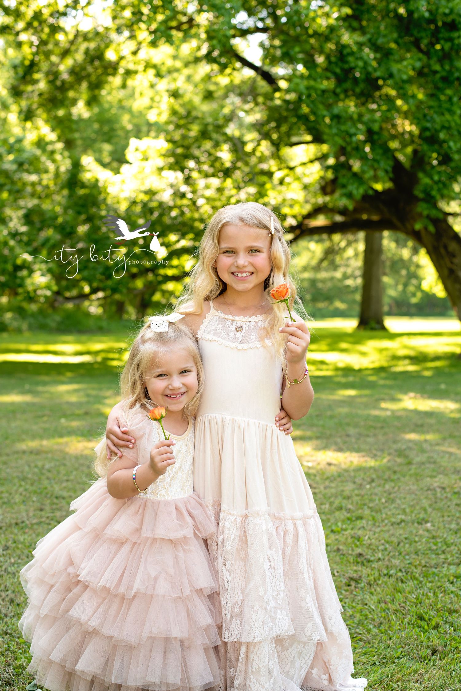 Cutie Pies Holding Roses for Tea Party Mini Photography Session with Ity Bity Photography Eylria Ohio