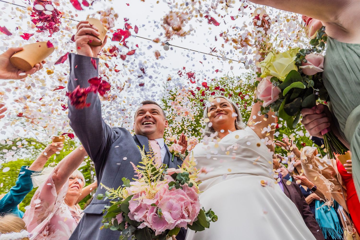 Confetti galore for this bride and groom at Westerham Golf Course on their wedding day