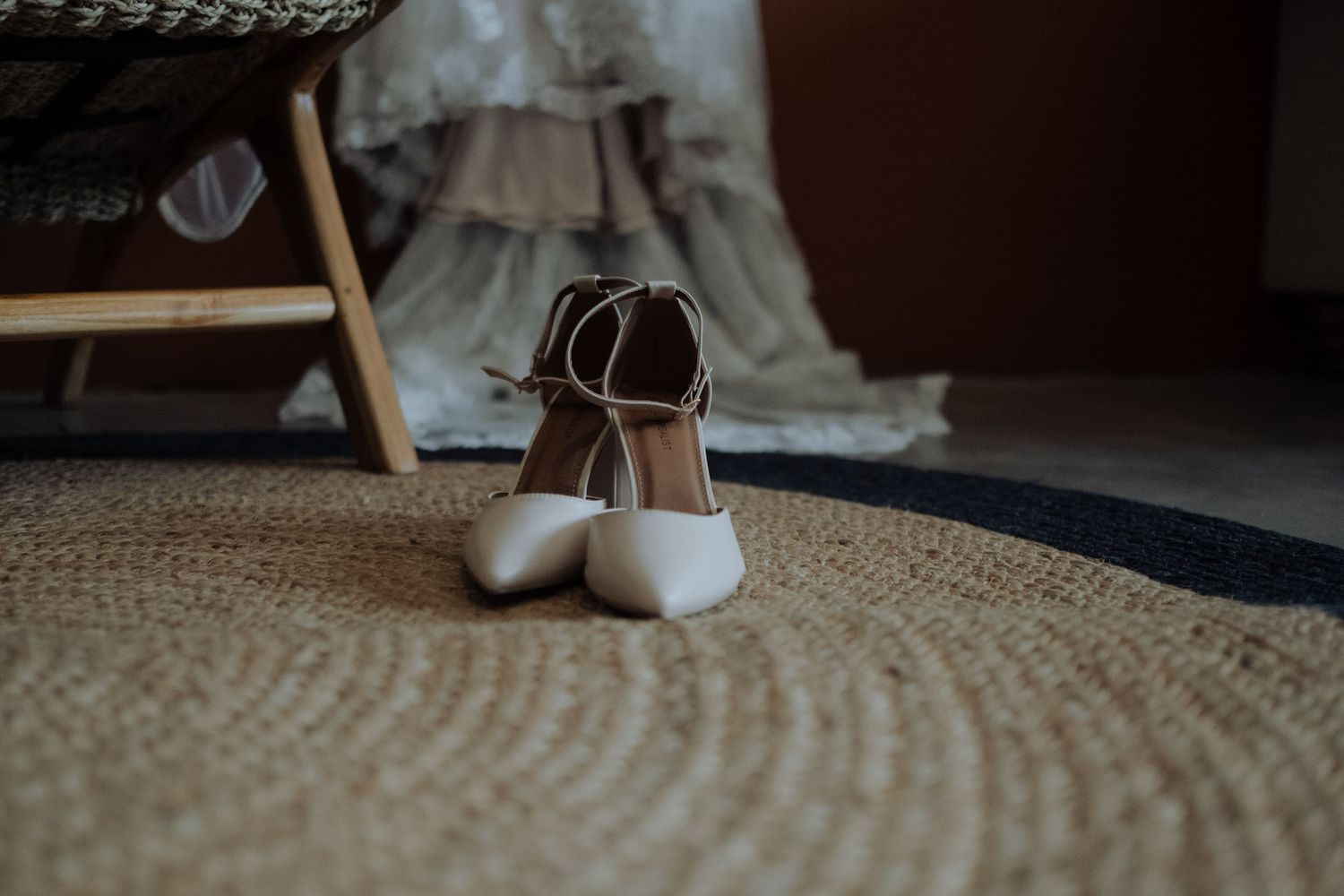 Bride shoes on floor infront of wedding dress, captured by Wouter Kleynhans Photography during wedding in Pretoria