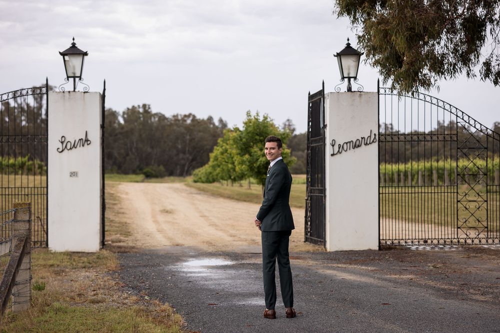 Groom waiting for his Bride at the gates of St.Leonards Vineyard before their wedding ceremony at St.Leonards Vineyard
