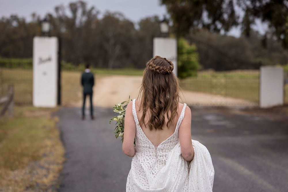 Groom waiting for his Bride at the gates of St.Leonards Vineyard before their wedding ceremony at St.Leonards Vineyard