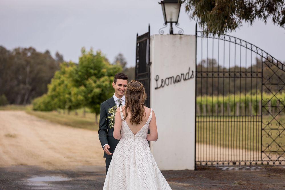Groom waiting for his Bride at the gates of St.Leonards Vineyard before their wedding ceremony at St.Leonards Vineyard