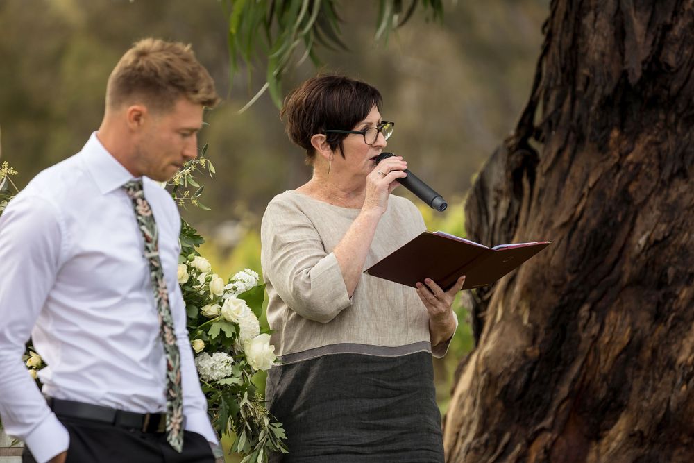 Celebrant speaking during a wedding ceremony at St.Leonards Vineyard.