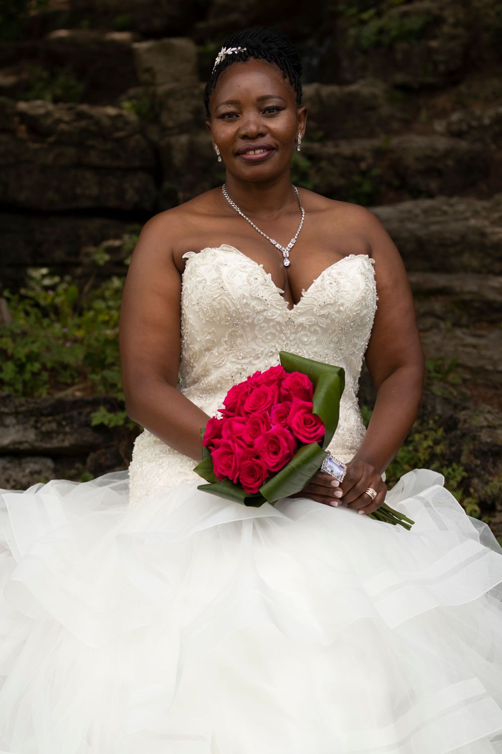 Bride sitting nicely with bouquet