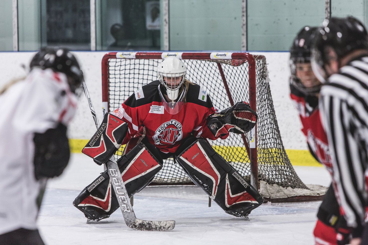 Action shot of Goalie during a Hockey Helps the Homeless tournament