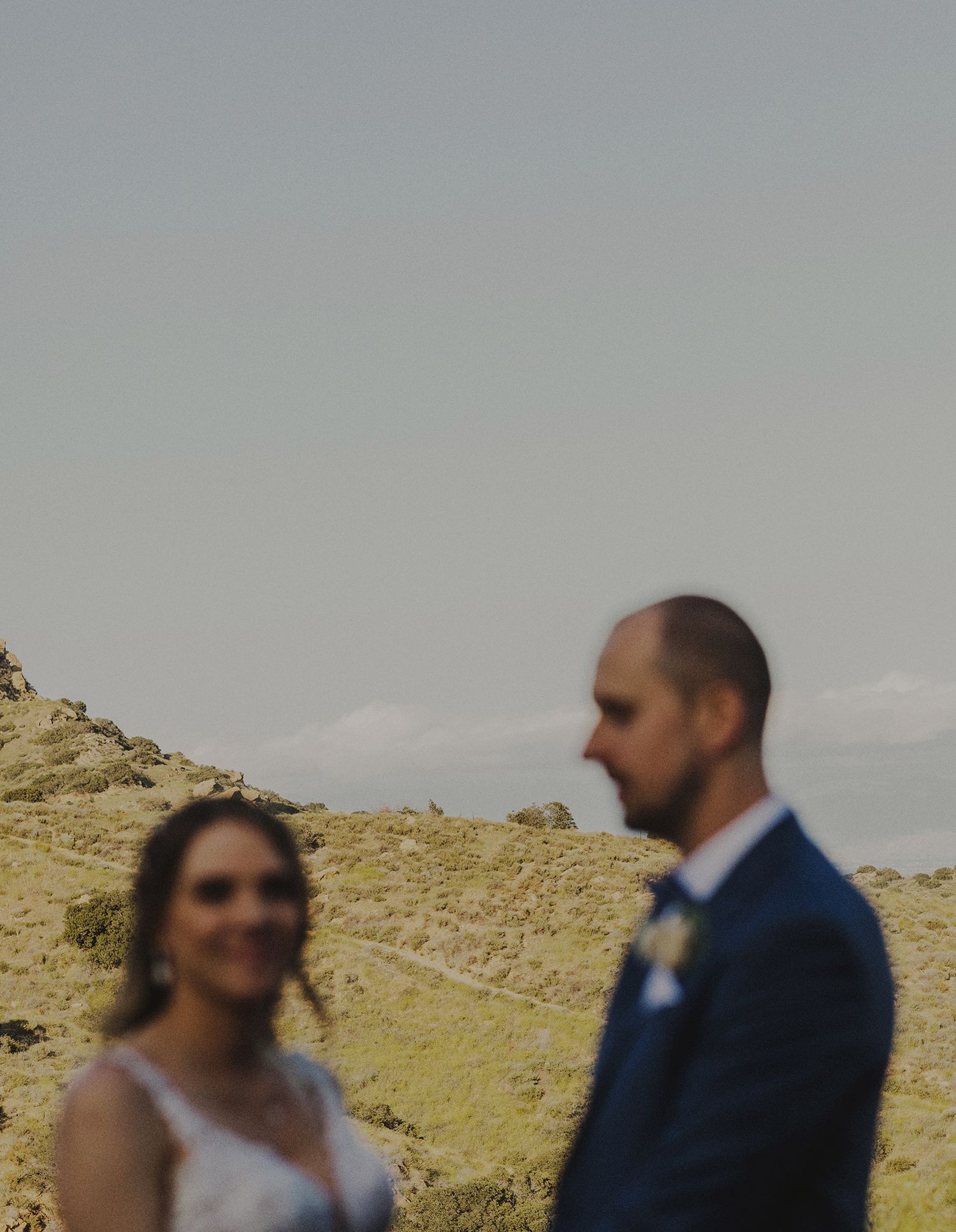E Noelle Photography backyard wedding in Hidden Hills Los Angeles, bride and groom blurry with clear landscape