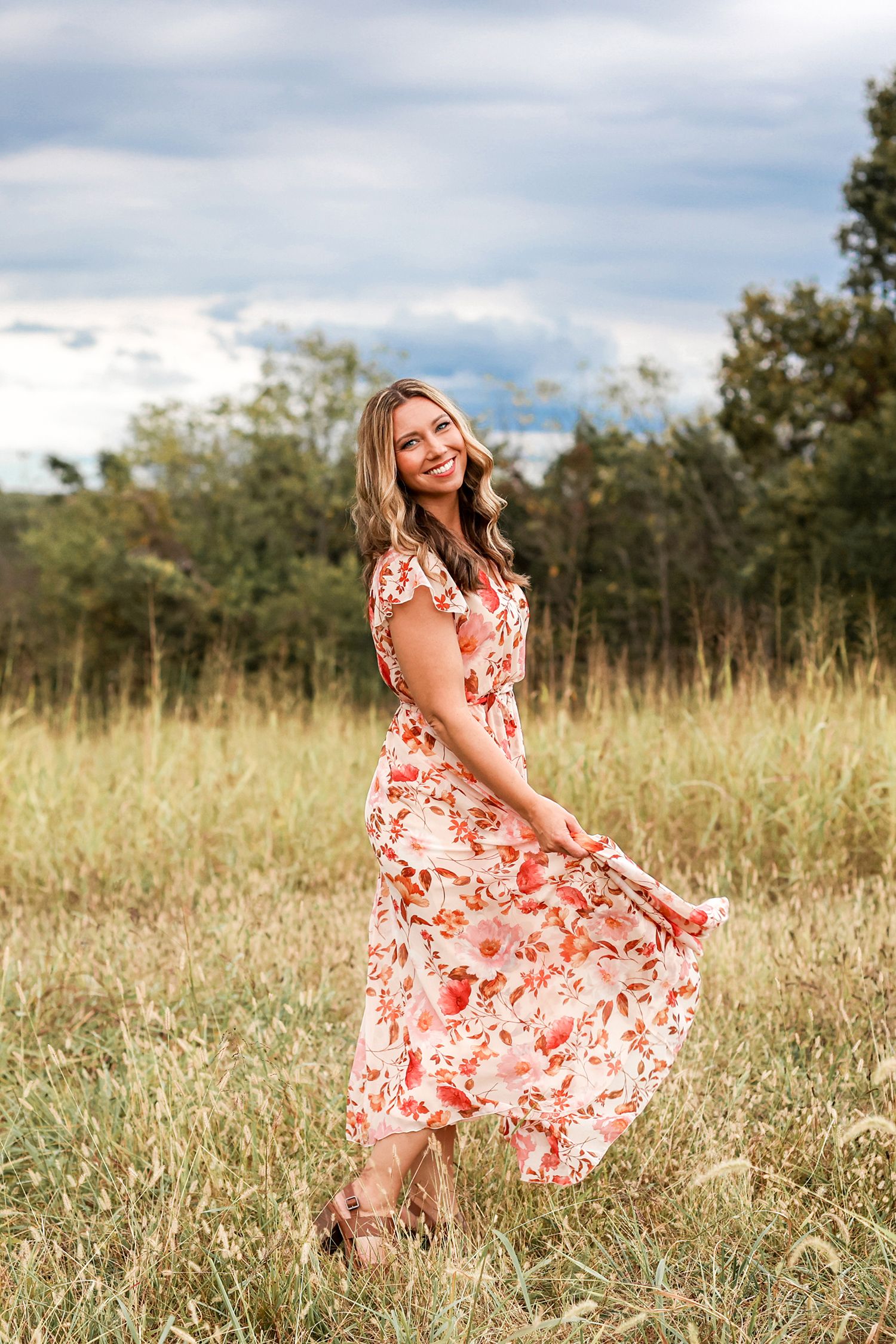 Keli Tetzlaff twirling in a field
