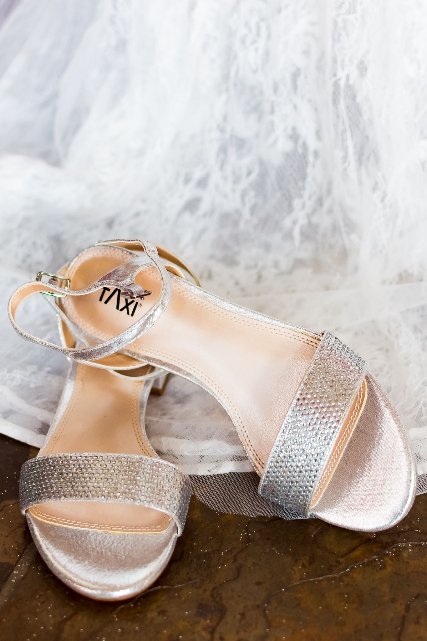 Detail shot of bride's wedding shoes in Hope, B.C. Photo taken by Kari Mills Photography, Wedding photographer.