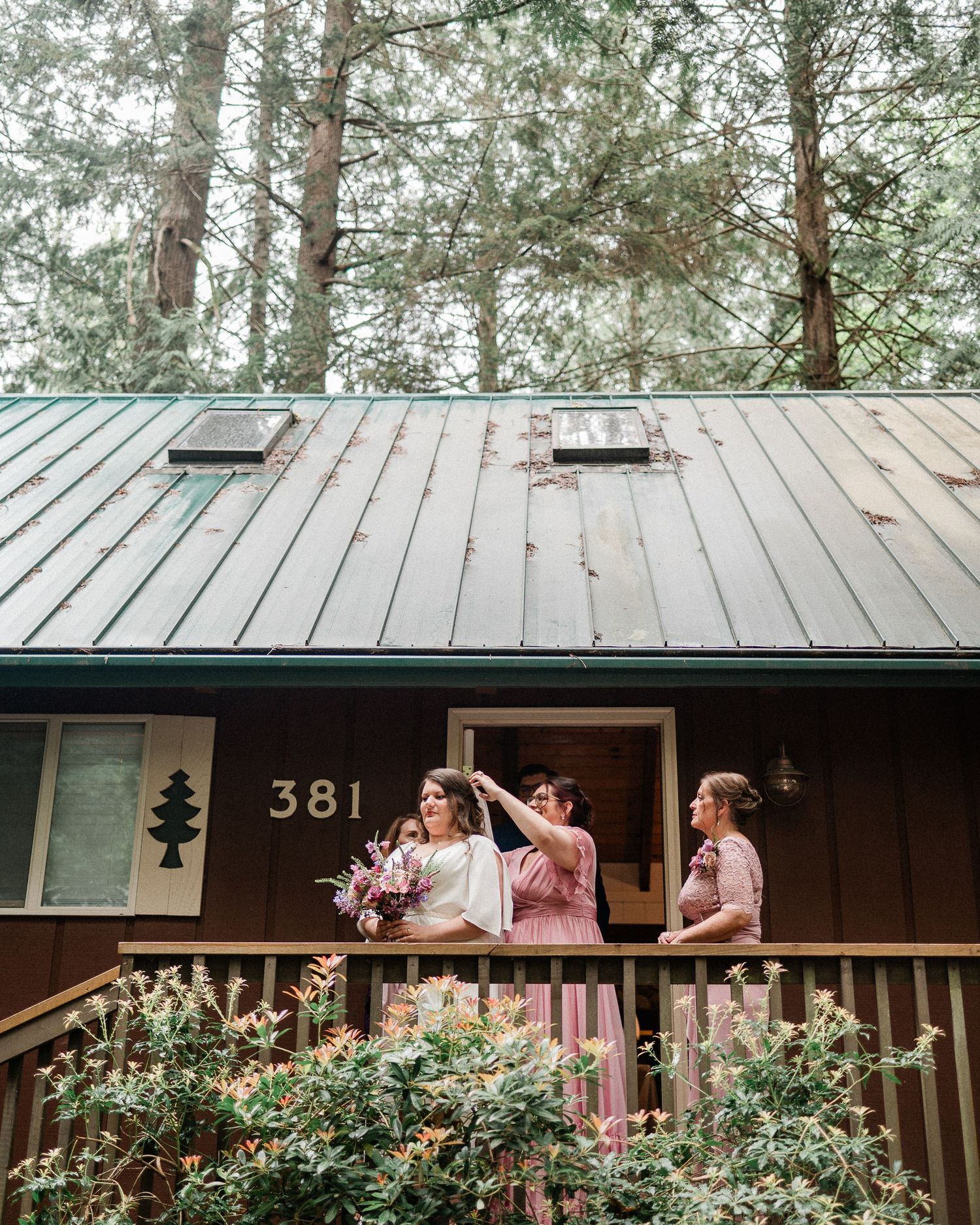 bride getting ready outside of cabin