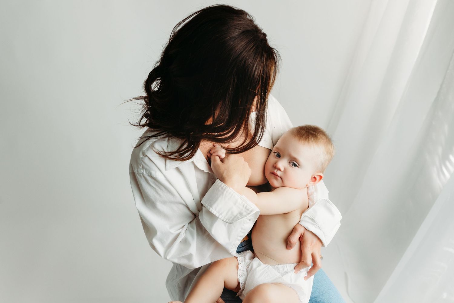 Mom breast feeding baby. Greenville sc newborn photographer, Easley sc newborn photographer, Upstate newborn photographer.