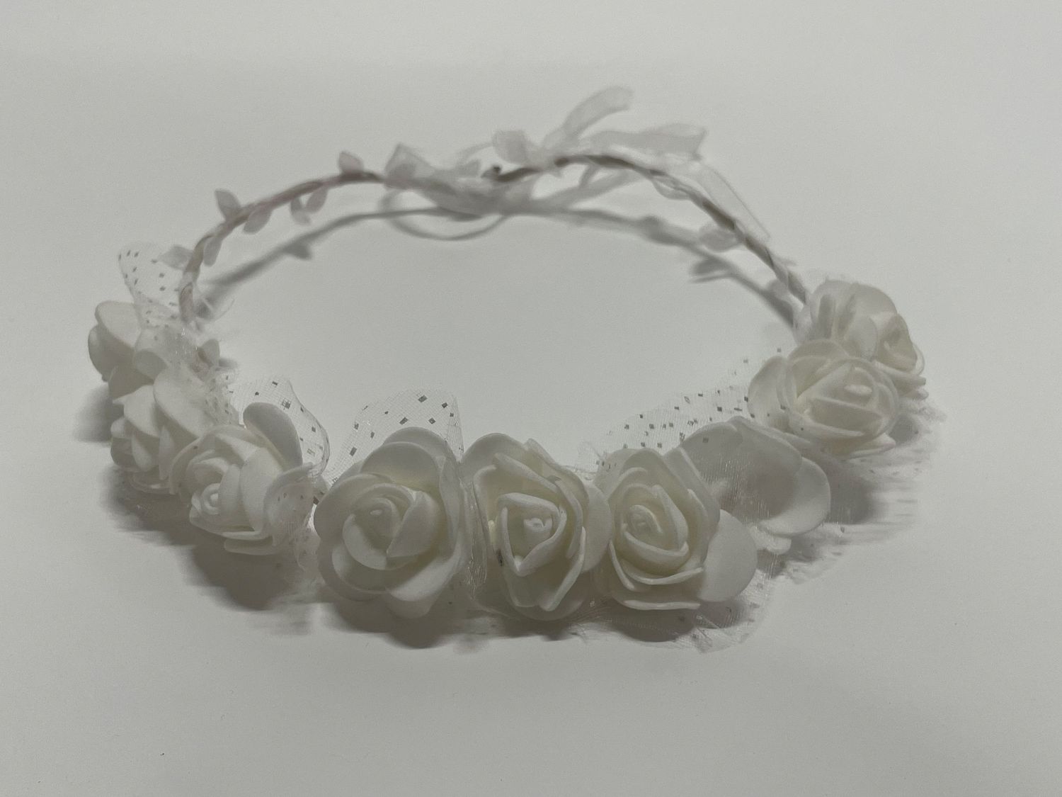 White lace and rose flower crown with delicate pearl details.
