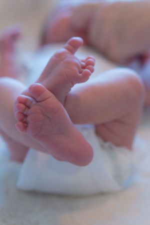 A close up of a newborn babies feet.