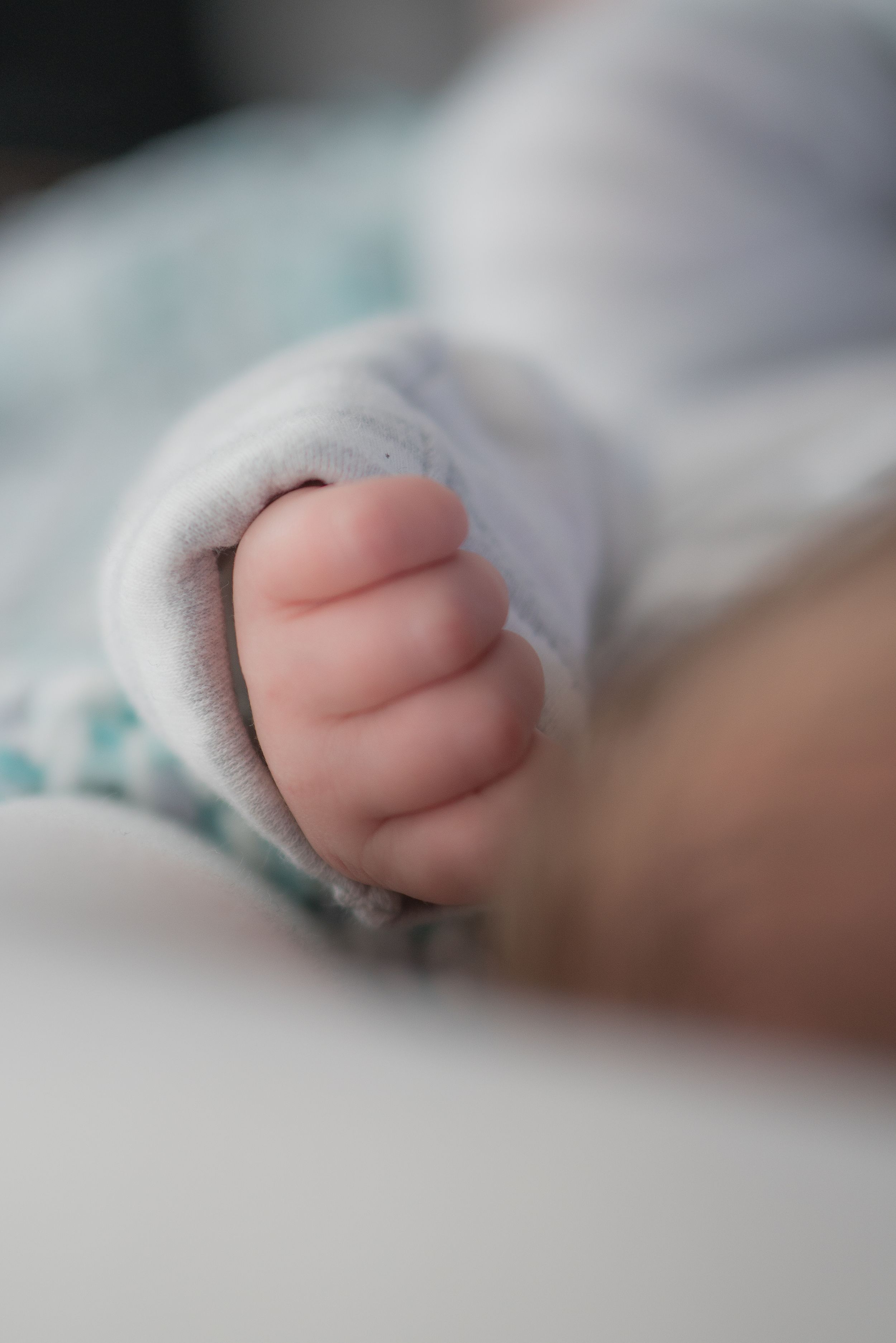 Close up of newbor babys hand.