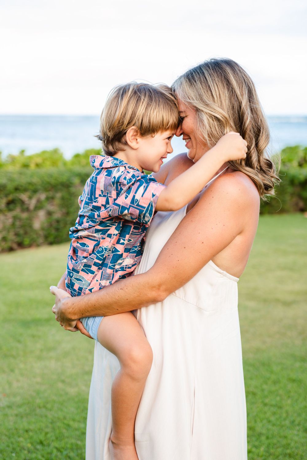 Candid mother and son for a family photography session in Oahu Hawaii.