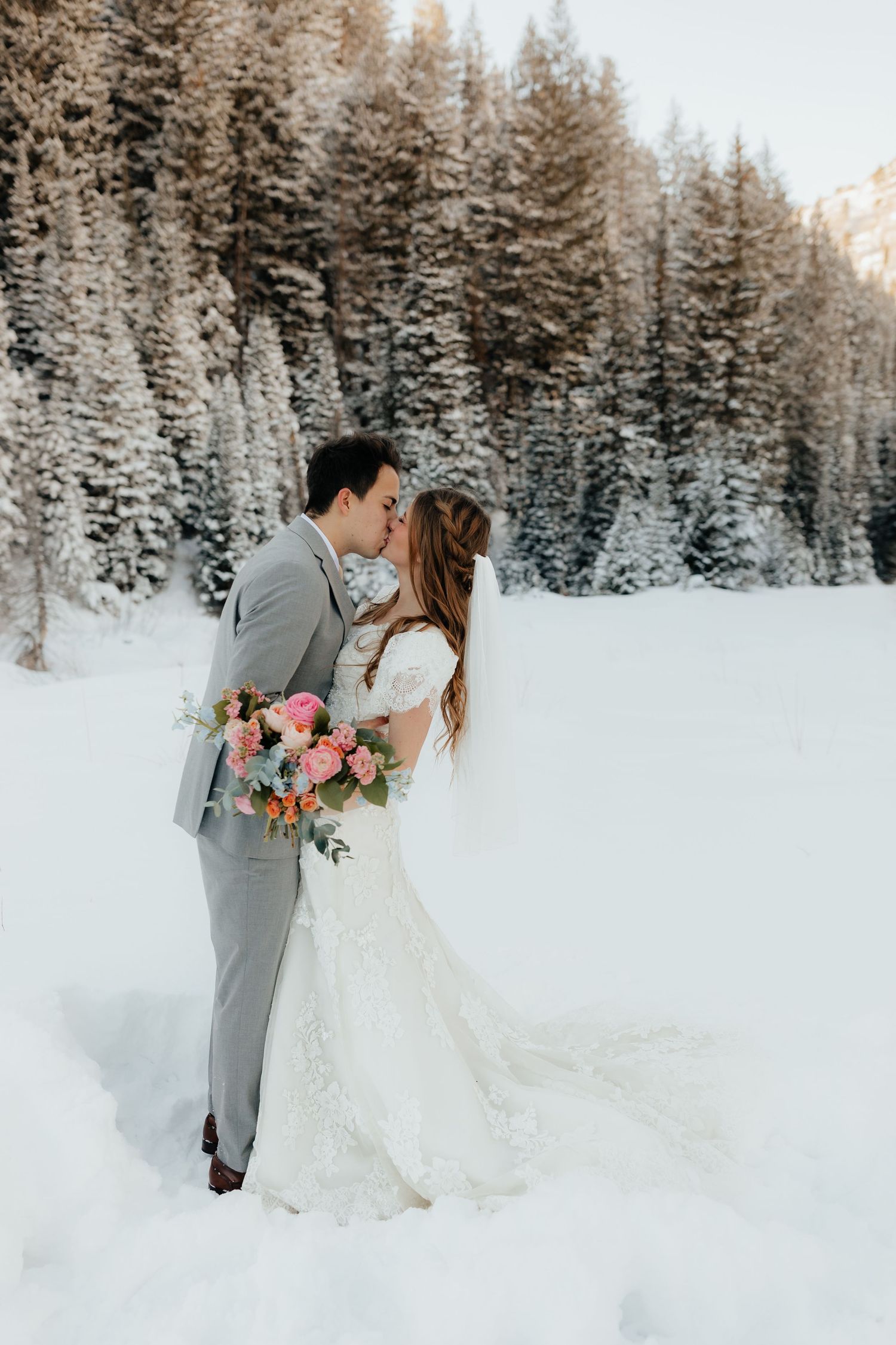 Bride and Groom kissing Utah Mountains