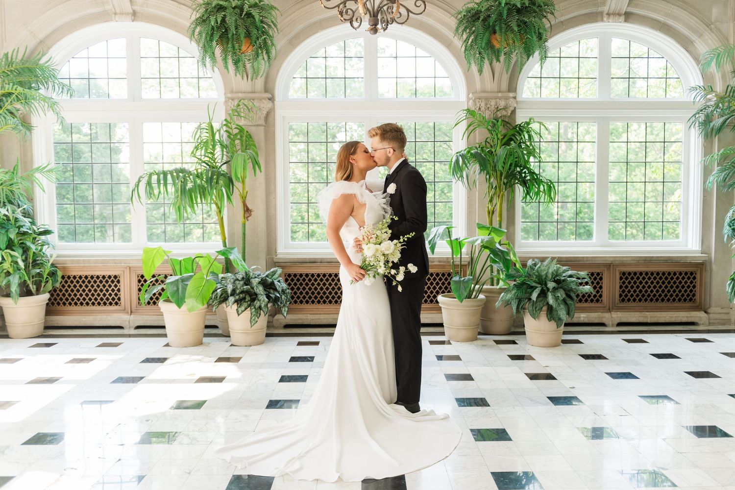 Indianapolis Indiana wedding photographer captures couple in Laurel Hall solarium by Jayme Riggleman Photography