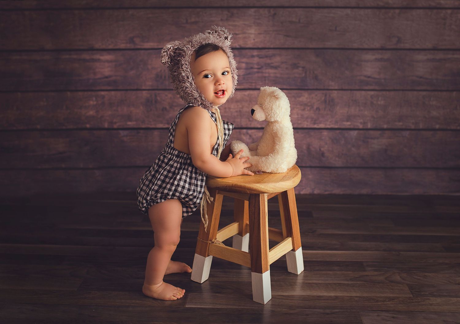 baby boy with teddy bear and bear bonnet wooden backdrop detres