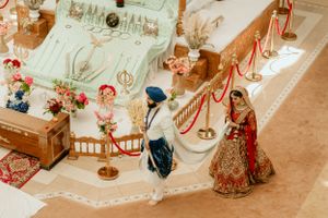 Overhead view of Sikh wedding ceremony showing traditional decorations and ceremonial setup.
