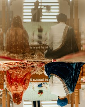 Creative reflection shot showing silhouettes of guests sitting with mirrored formal attire in red and blue.