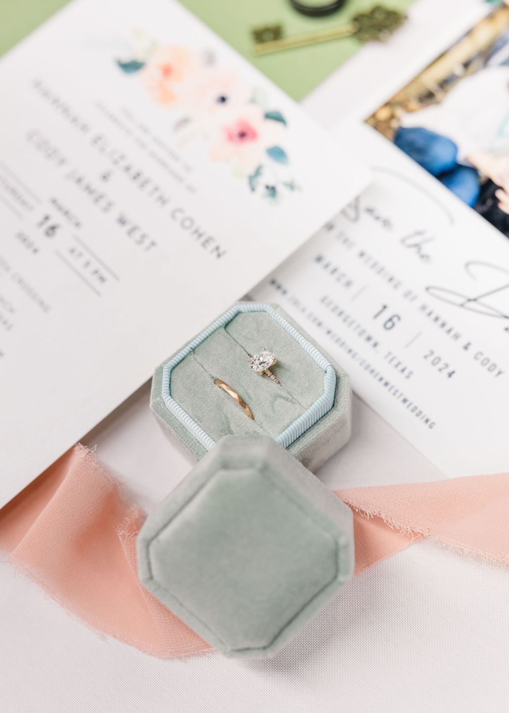 wedding rings in sage green velvet ring box