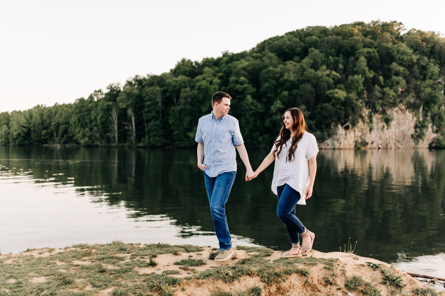 Husband and wife holding hands and walking