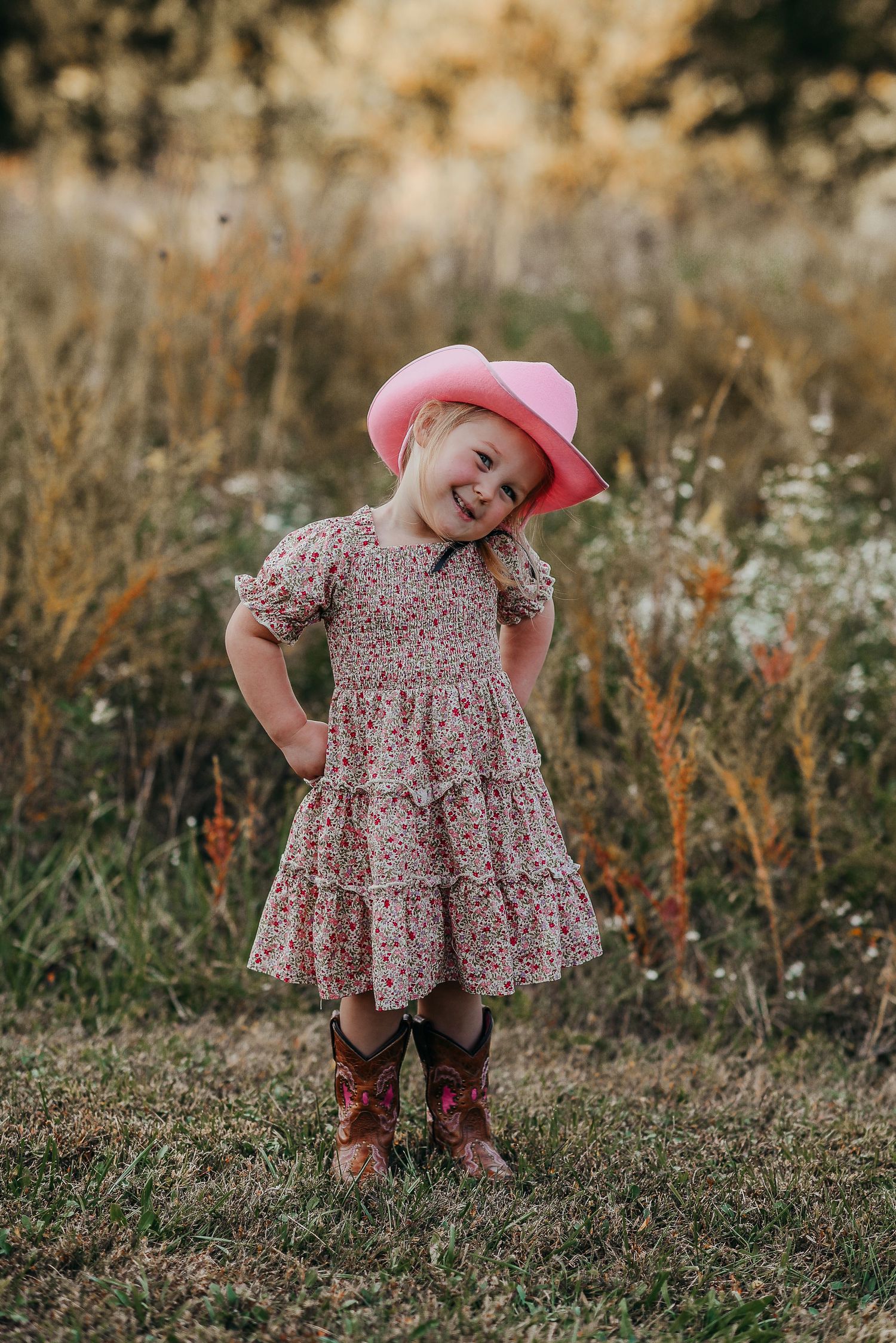Three sequence photos of a child playing in a floral dress outdoors during golden hour.