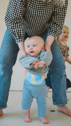colourful baby moment in studio during motherhood sessions
