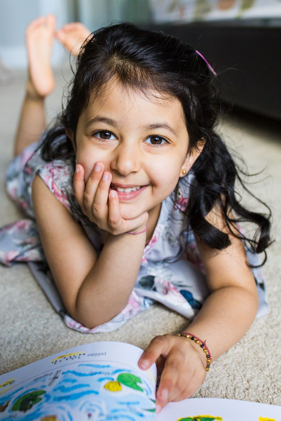 Big sister smiling for a portrait
