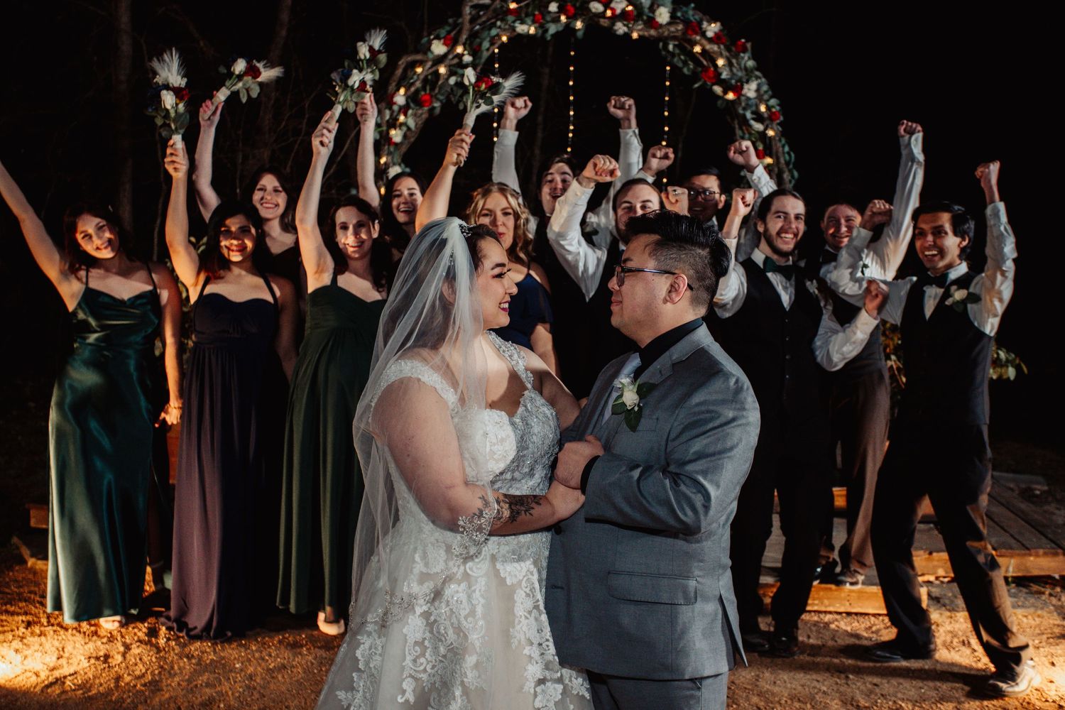 Boho Wedding with White Dress and Grey Suit With Royal Blue and Crimson Flowers at Arrowhead Weddings and Events