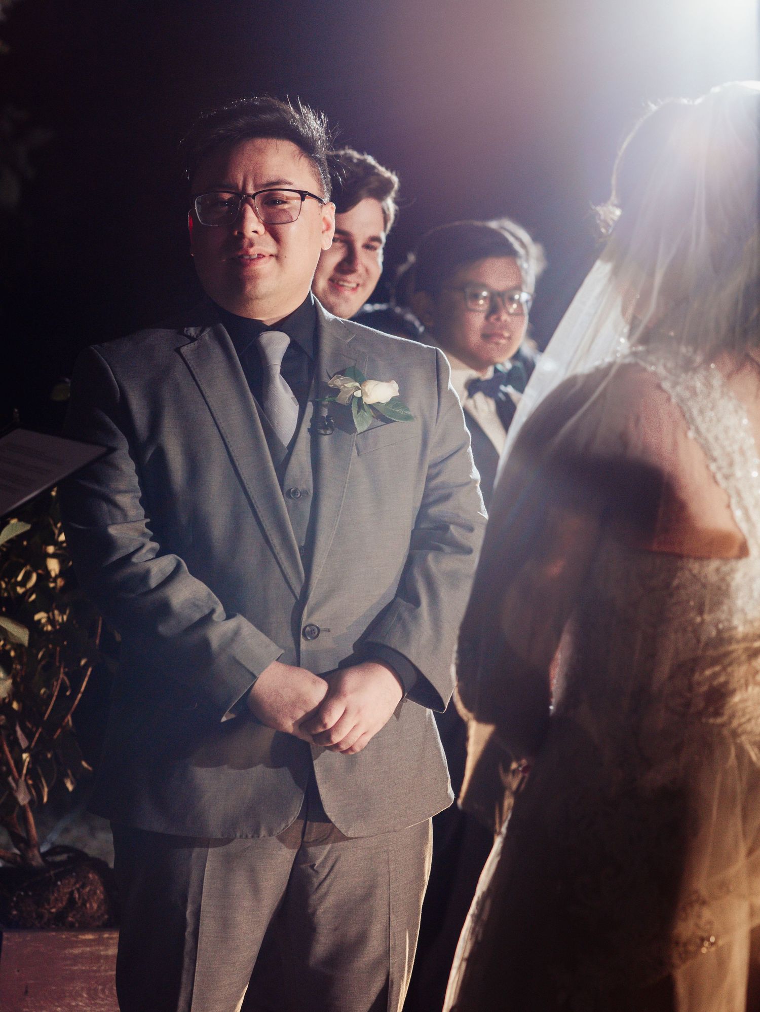Boho Wedding with White Dress and Grey Suit With Royal Blue and Crimson Flowers at Arrowhead Weddings and Events