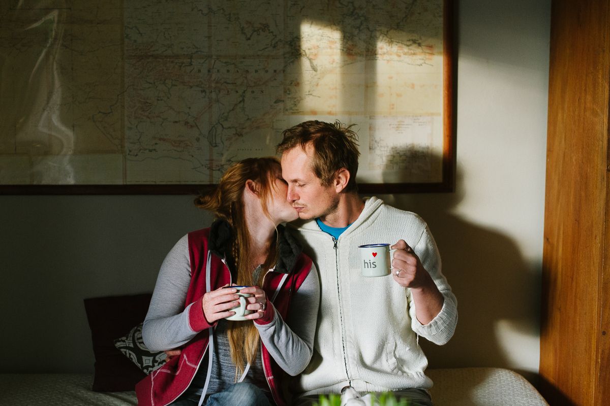 A cozy indoor coffee moment with natural light streaming through the window.
