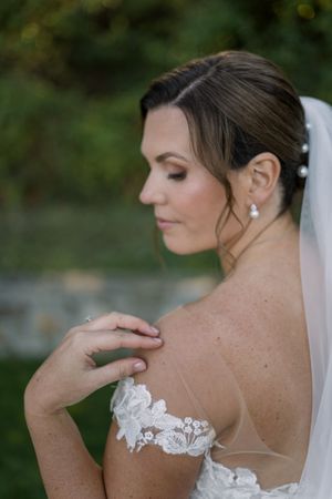 A series of close-up bridal portraits showing delicate lace details on a wedding dress and veil.