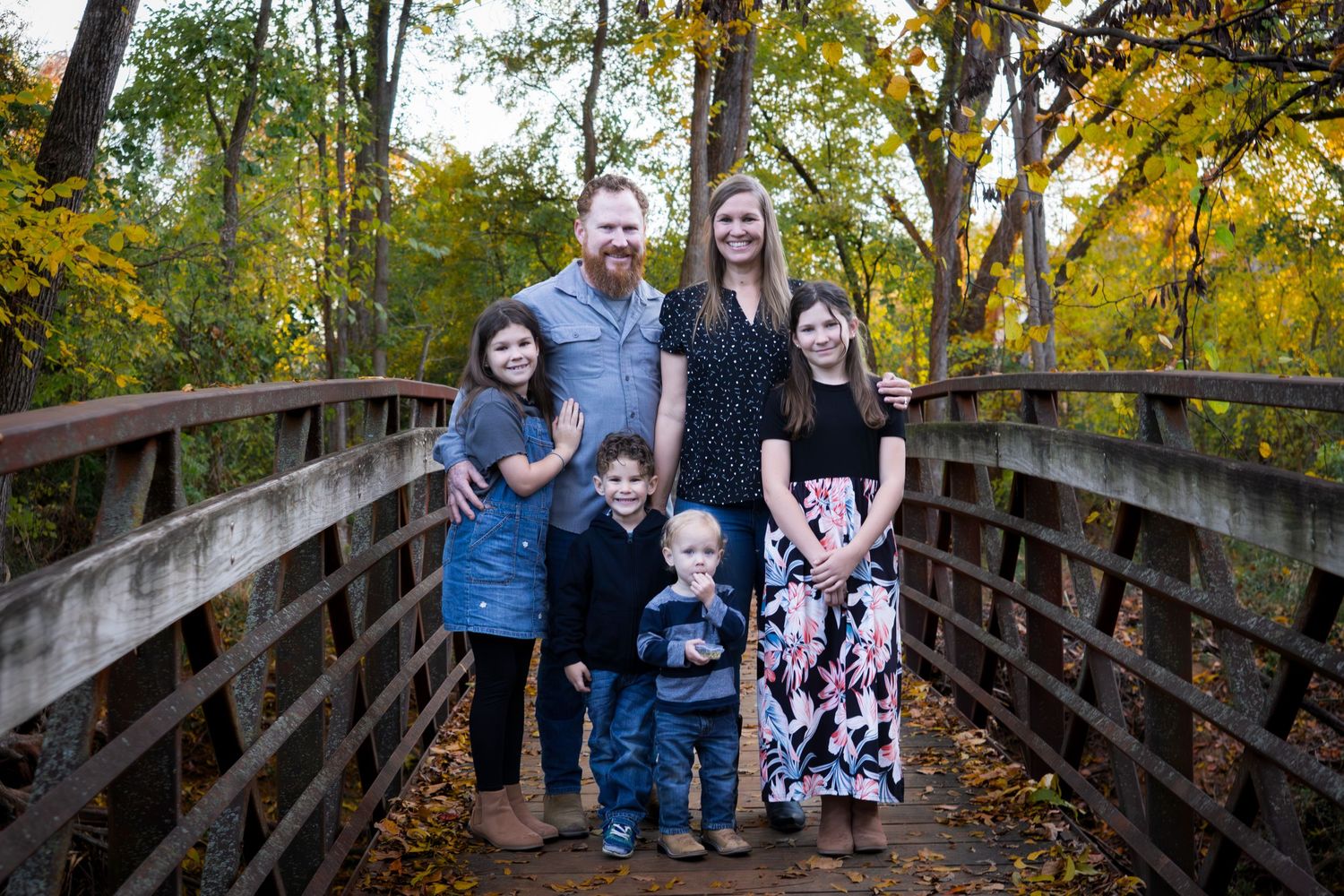 Colleyville nature center bridge fall family session mini session orange leaves fall colors