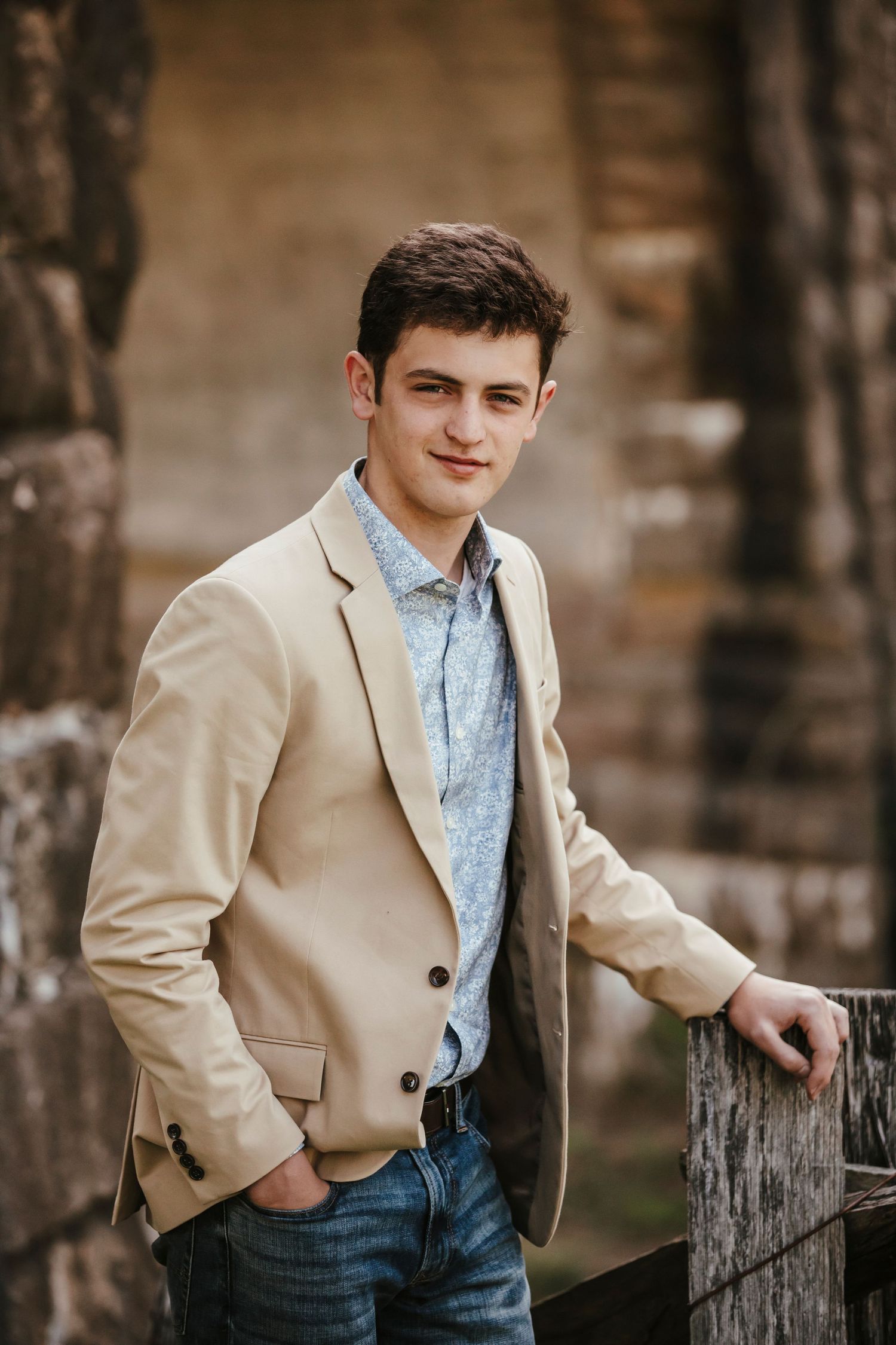 A series of professional portraits showing someone wearing a beige blazer and light blue shirt against a blurred outdoor background.