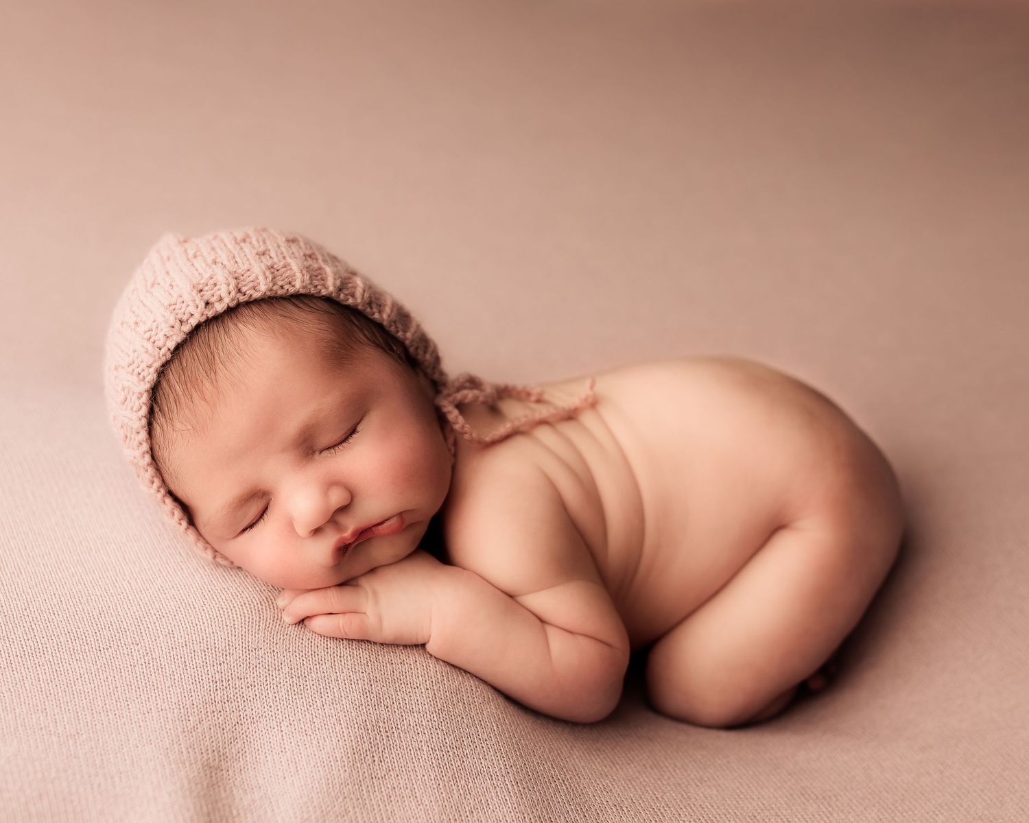 Palmerston North Newborn Baby Family Photographer. Pink with knitted hat