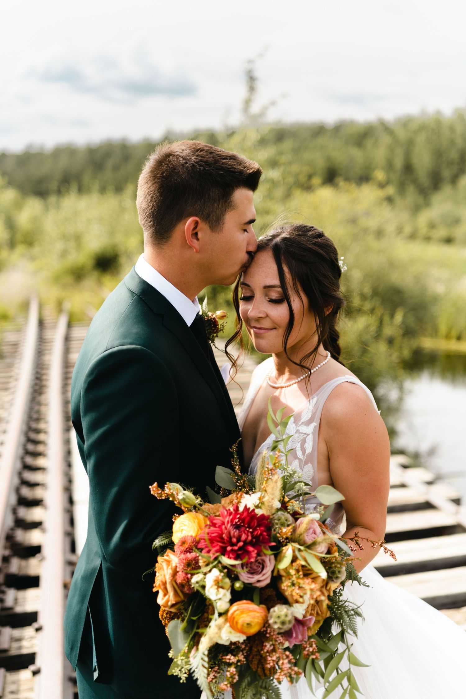 Bride + Groom Photo session. Demmit Hall Wedding Pictures taken by Grande Prairie Wedding Photographer The Tollefsons