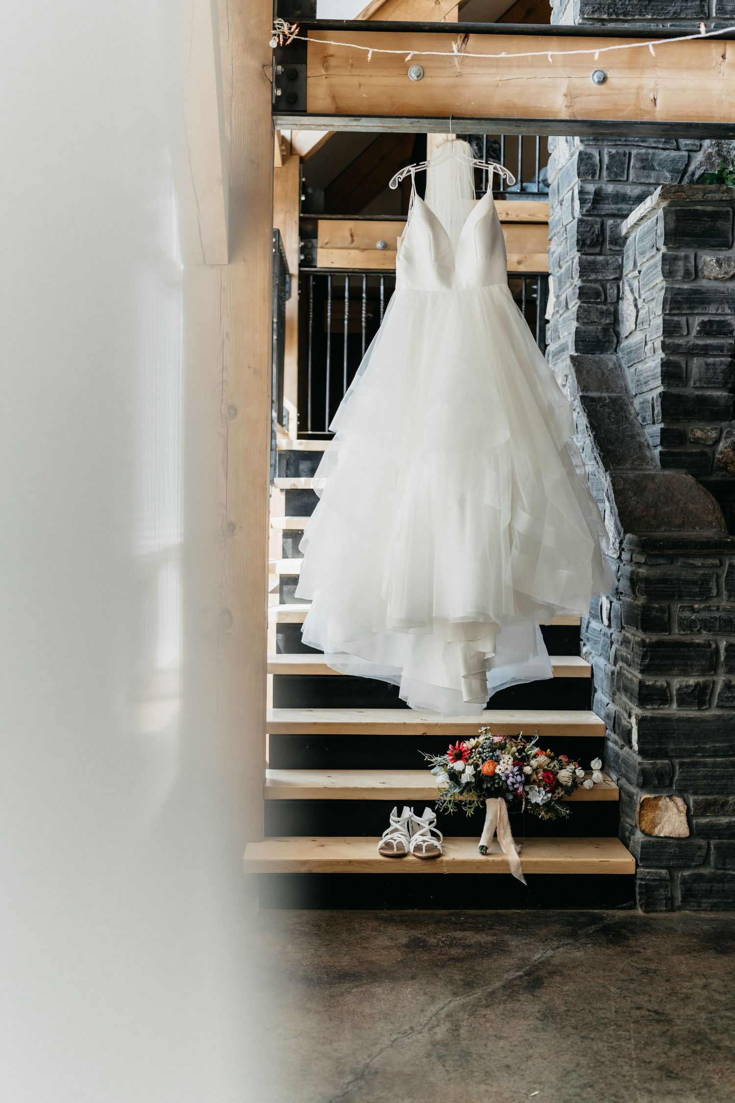 Wedding dress displayed at Demmit Hall with the shoes, flowers and veil