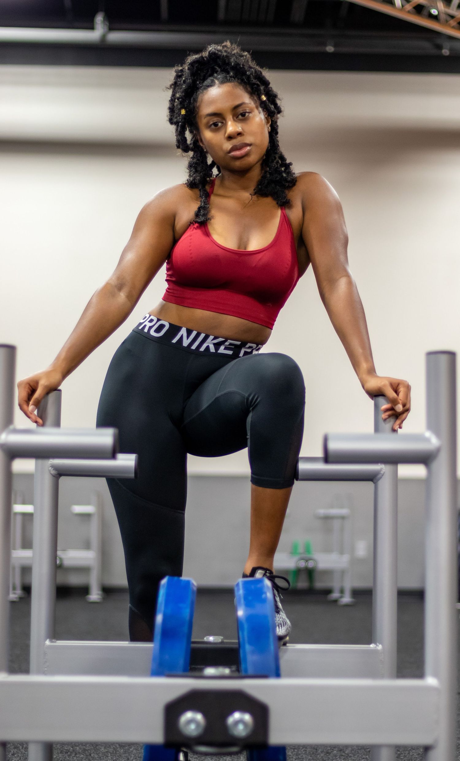 Fitness model posing with equipment in Crunch Gym in Hoover, AL.